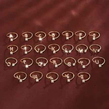 Adjustable Copper Initial Ring with Four-Claw Round Zirconia