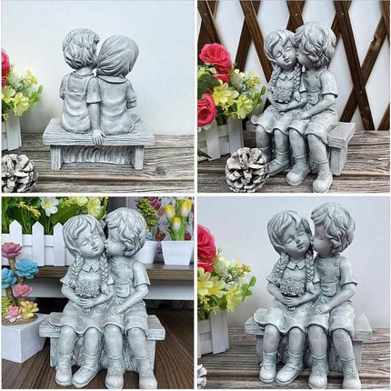 Boy Kissing Girl Statue Sitting on Bench Figurine