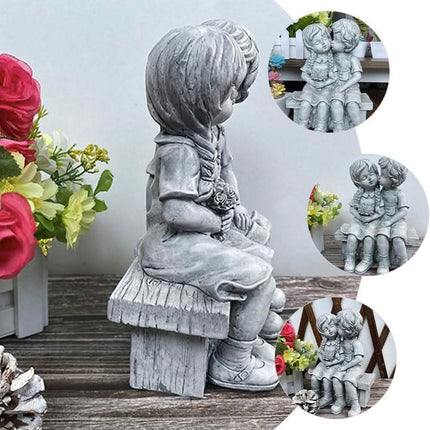 Boy Kissing Girl Statue Sitting on Bench Figurine